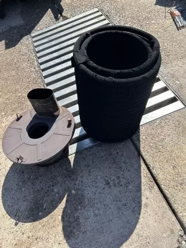 Boiler coil removed from Nilfisk DTE 500HM hot pressure washer during contaminated fuel repair in Leicester.